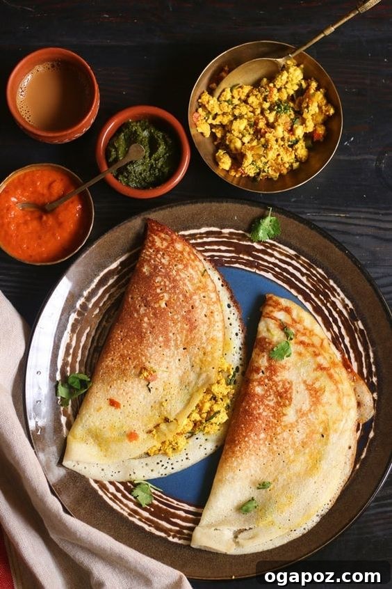 Paneer Perfection: 52+ Recipes for Every Palate 37 Crispy and golden Paneer Dosa, a South Indian crepe filled with spiced paneer, herbs, and lemon juice.
