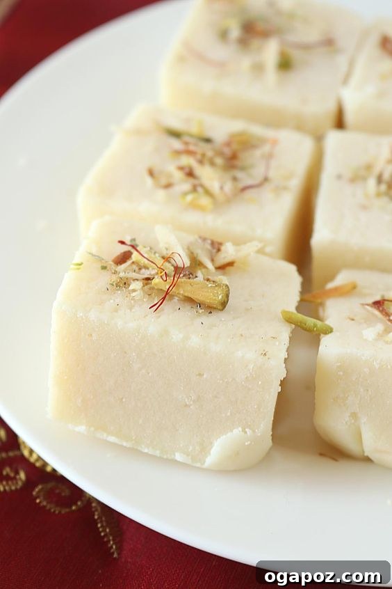 Paneer Perfection: 52+ Recipes for Every Palate 42 Rich and delightful Paneer Burfi, a popular Indian sweet, especially enjoyed during Diwali.