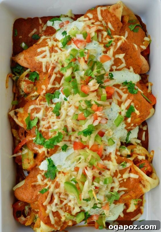 Paneer Perfection: 52+ Recipes for Every Palate 47 Creative Paneer Naanchiladas, an exciting Indian-style enchilada dish filled with crunchy veggies and tikka flavors.