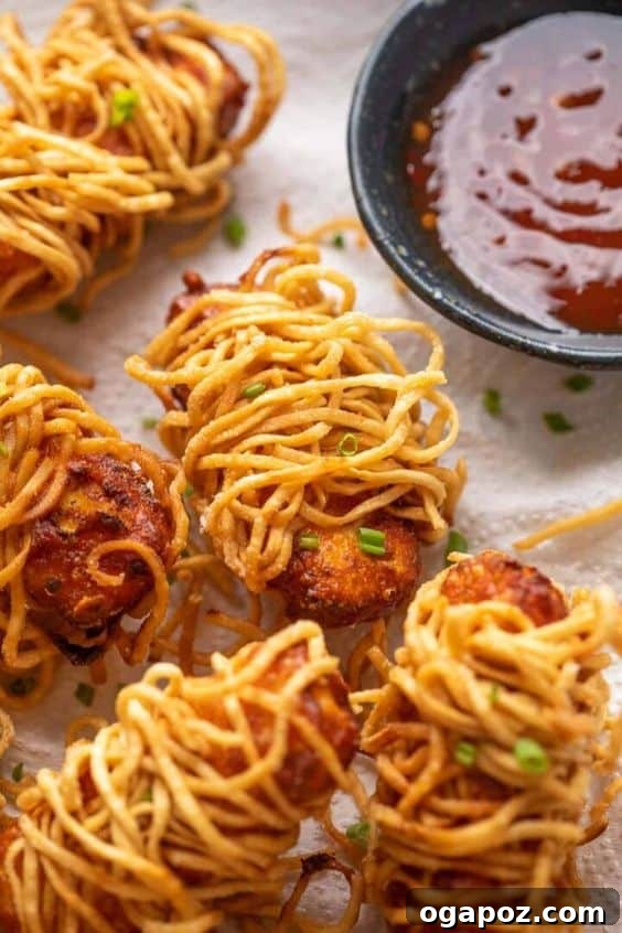 Paneer Perfection: 52+ Recipes for Every Palate 52 Visually stunning and delicious Crispy Thread Paneer, a fun appetizer idea that looks and tastes fantastic.