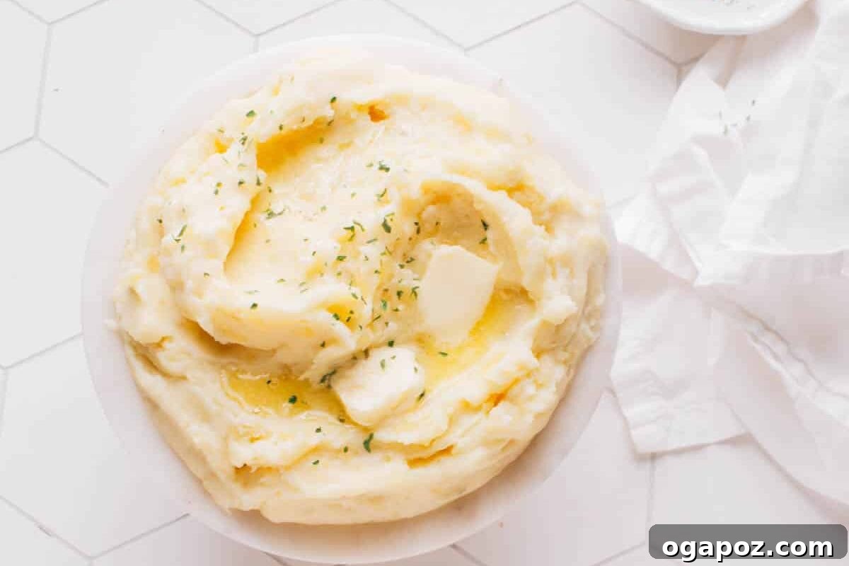 Ultra Juicy Air Fryer Roast Beef 9 A bowl of mashed potatoes with butter.