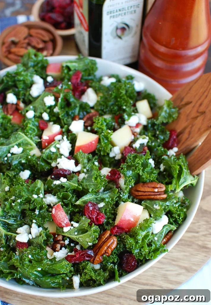 Close-up of Kale Salad with Cranberries featuring sliced apples