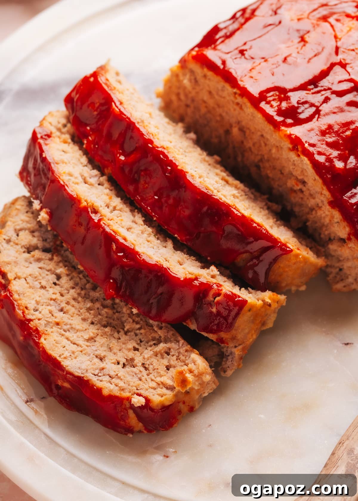 Ultimate Meatloaf Flavor Mix 9 A close-up shot of a perfectly sliced meatloaf, revealing its tender, juicy interior.
