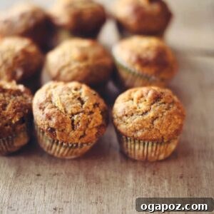 Pumpkin Zucchini Muffins on a table, ready for serving.
