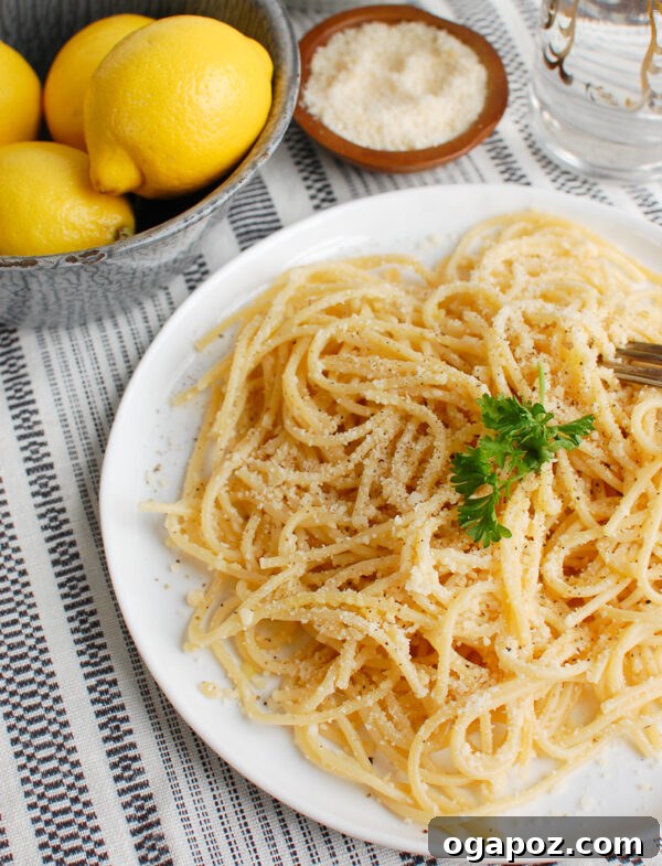 Bright Lemon Pasta 2 Bright Lemon Pasta garnished with fresh lemons, ready to be served.