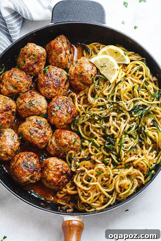 37 Delicious Ways to Enjoy Healthy Ground Turkey 23 Garlic Butter Meatballs and Zucchini Noodles in a pan.