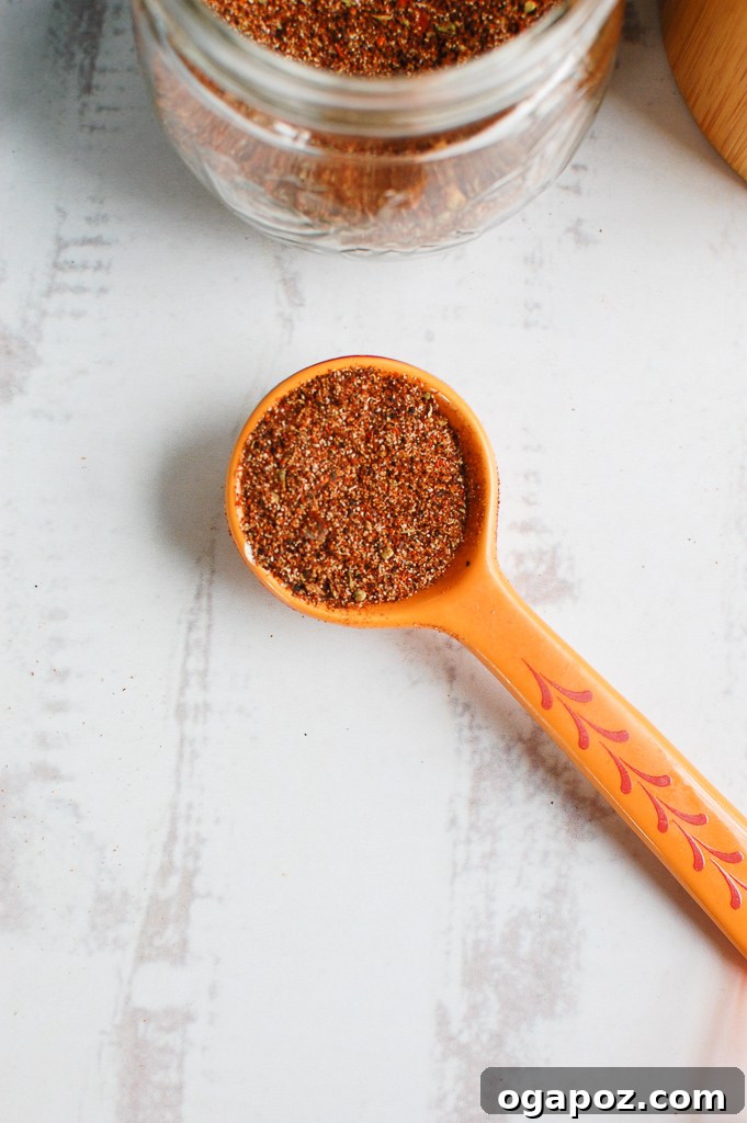 Better-Than-Store-Bought Taco Seasoning 3 Homemade Taco Seasoning Recipe with various spices displayed on a spoon