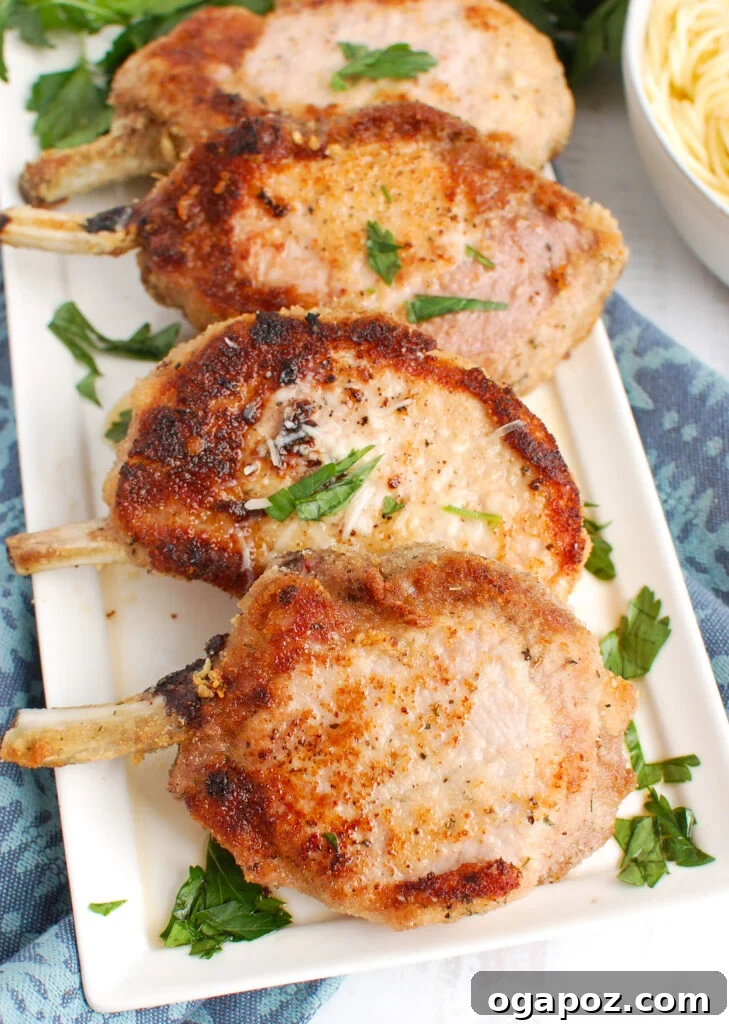 Mastering Tender Oven Baked Pork Chops 5 How to Bake Pork Chops in the Oven on platter
