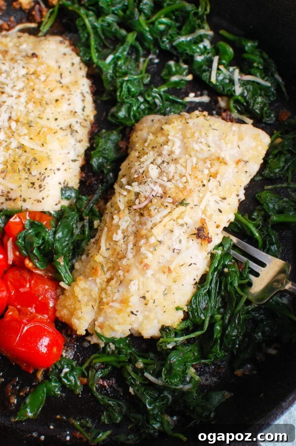 Effortlessly Delicious Black Sea Bass 3 Black Sea Bass Recipe served with sautéed spinach and lemon wedges