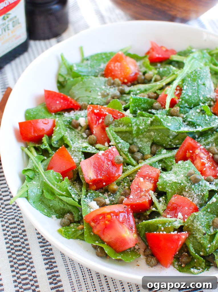 Rocket and Caper Salad 4 A vibrant Arugula Salad with Capers, ready to be enjoyed. This simple yet sophisticated salad is packed with flavor and nutrition. #saladrecipe #arugulaandcapers #healthydinner