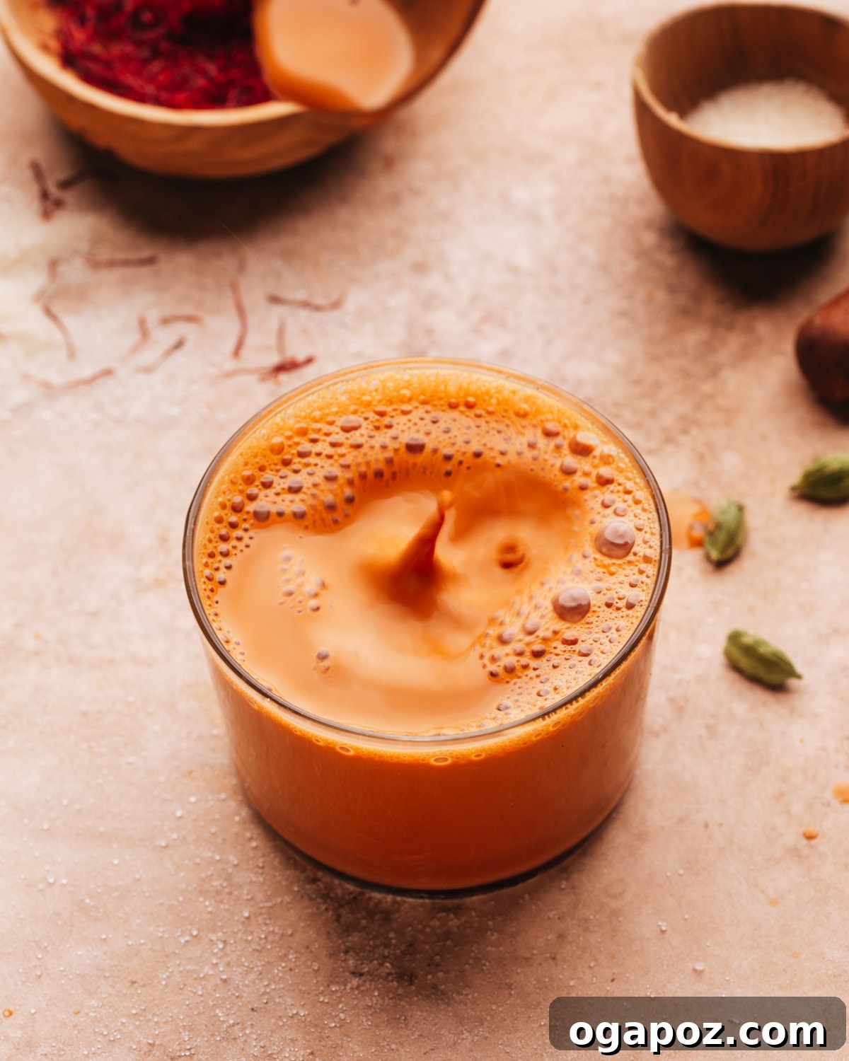 Authentic Karak Chai Made Simple 10 A glass of Karak Chai with a handle, served warm and ready to drink, reflecting its comforting essence.
