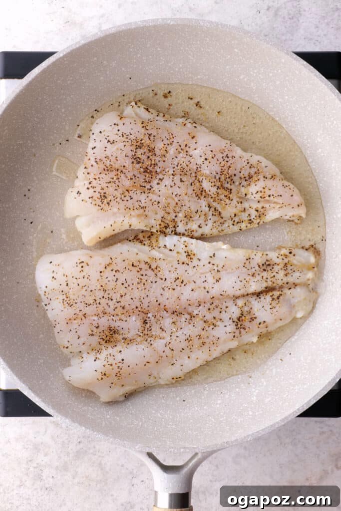 Golden Crispy Cod and Potato Patties 3 Fresh cod fillet seasoned with a blend of herbs and spices before cooking.