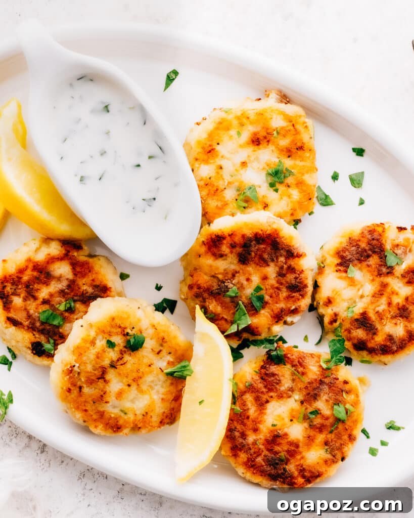 Golden Crispy Cod and Potato Patties 9 Crispy potato fish cakes served with a side of creamy mayonnaise or tartar sauce.