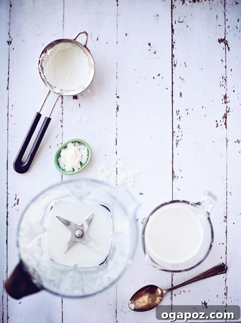 Whip Up Your Own Coconut Milk 2 Creamy homemade coconut milk being blended to perfection in a high-speed blender.