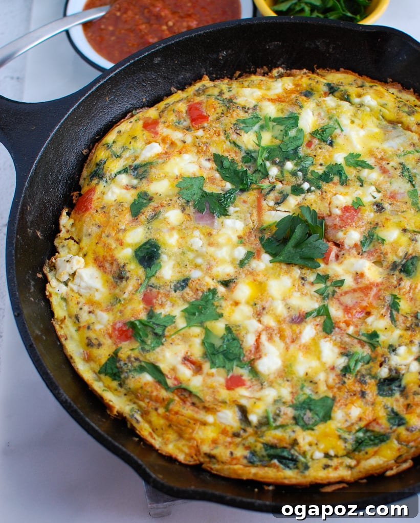 Close-up of Mediterranean Frittata with vibrant harissa colors