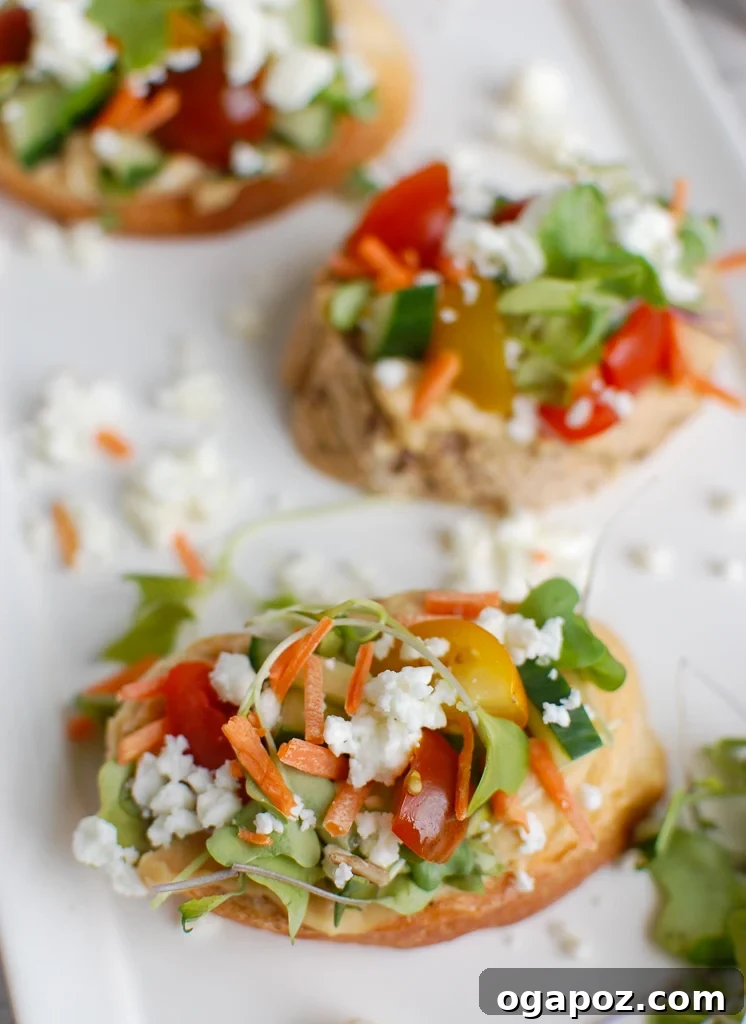Sun-Kissed Mediterranean Bites 3 Mediterranean Crostini on a white platter