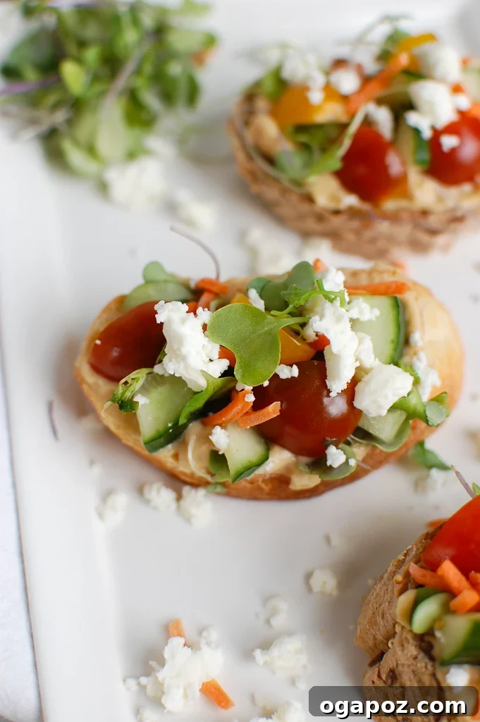 Sun-Kissed Mediterranean Bites 4 Mediterranean Crostini on a white plate