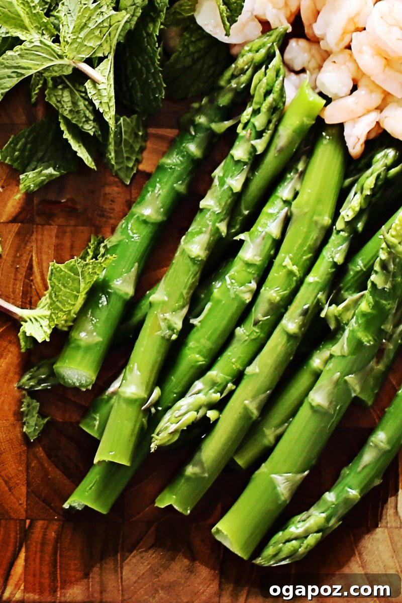 Asparagus, Chard and Soba Summer Rolls with Spicy Peanut Sauce 3 A close-up of a baby's hands playing.