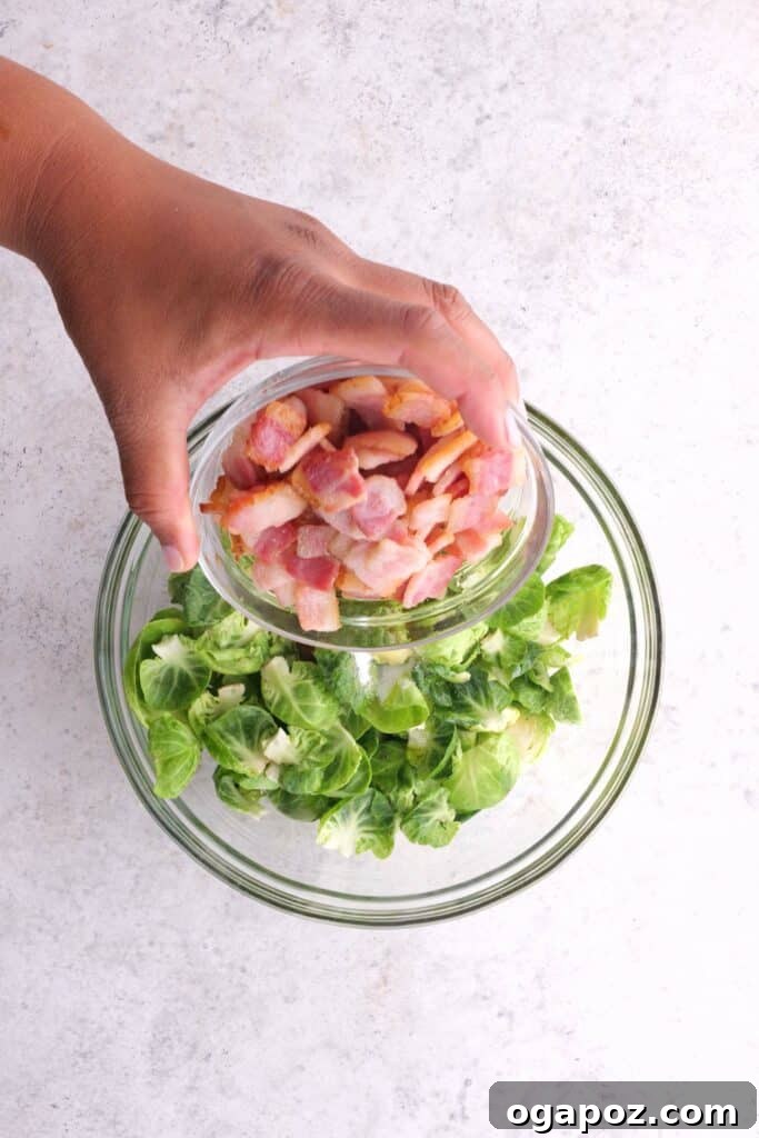 Irresistible Maple Bacon Brussels Sprouts 6 Mixing the ingredients into the bowl.
