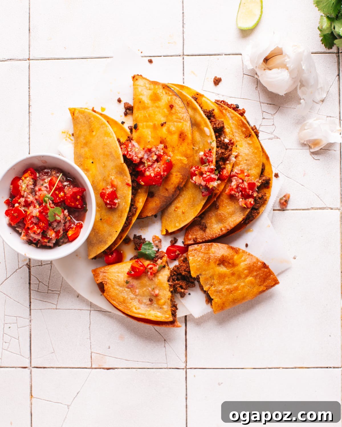 Golden Crispy Tacos Made Effortless 2 Fried tacos on a plate with taco salsa.
