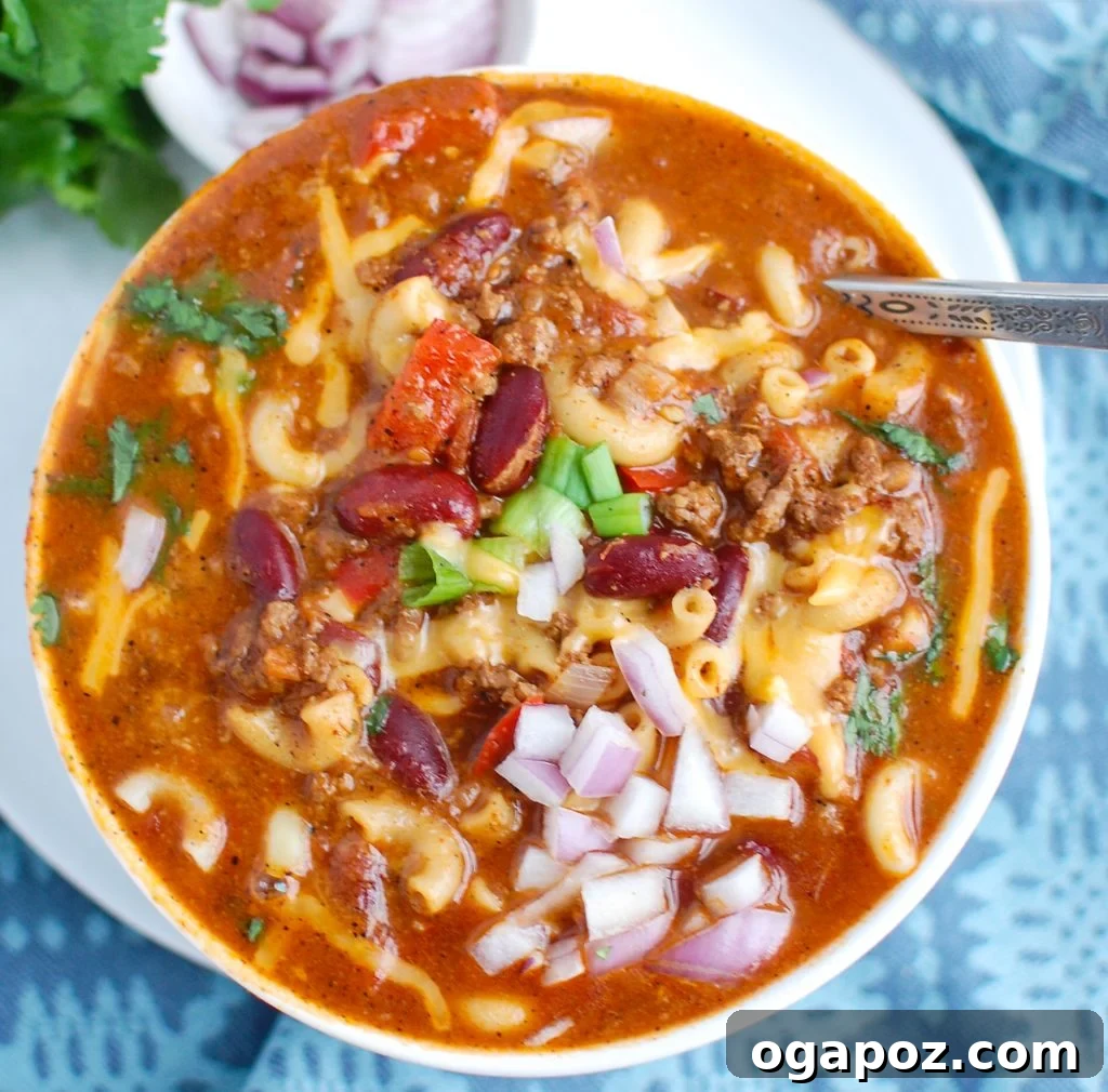 Ultimate Instant Pot Chili Mac 3 Instant Pot Chili Mac topped with red onions in a white bowl