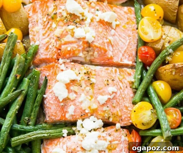 Mediterranean Salmon Sheet Pan with colorful vegetables.