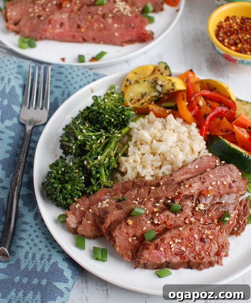 Sweet and Savory Asian Flank Steak 5 Asian Marinated Flank Steak served with a medley of colorful roasted vegetables
