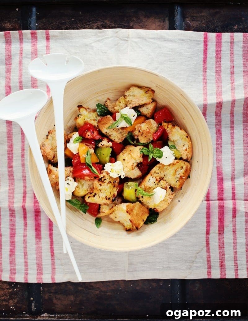 Vibrant Panzanella salad with grilled bread and fresh tomatoes