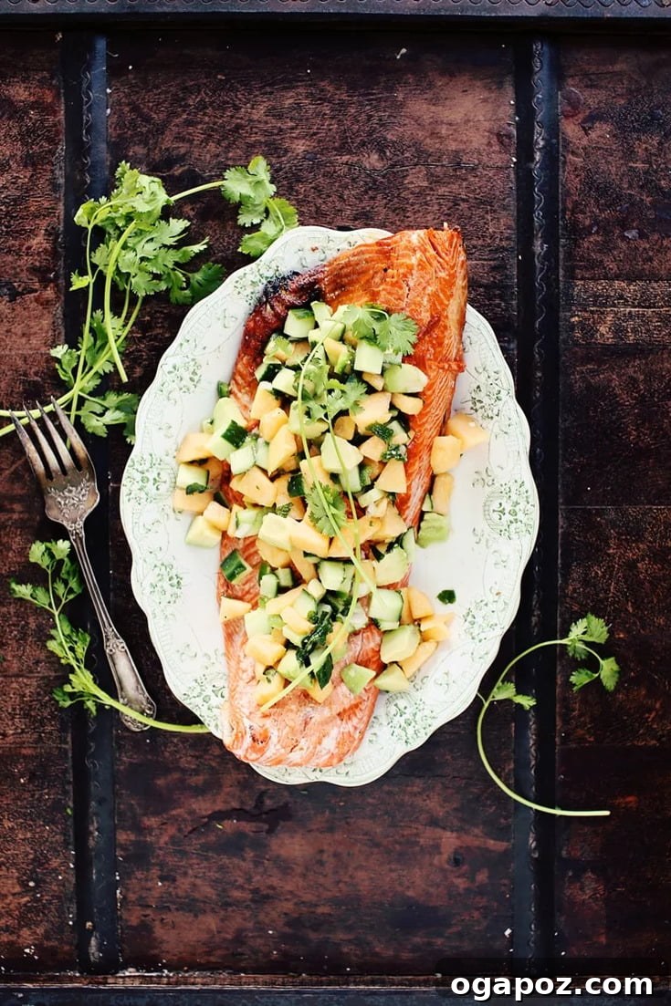 Grilled Salmon with Summer Bloom Salsa 4 Delicious and healthy grilled salmon recipe with a creamy avocado-melon salsa, perfect for a light weeknight meal at home, showcasing the dish's appeal.