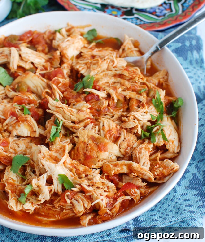 Effortless Instant Pot Shredded Chicken 2 Easy Instant Pot Shredded Chicken in white bowl