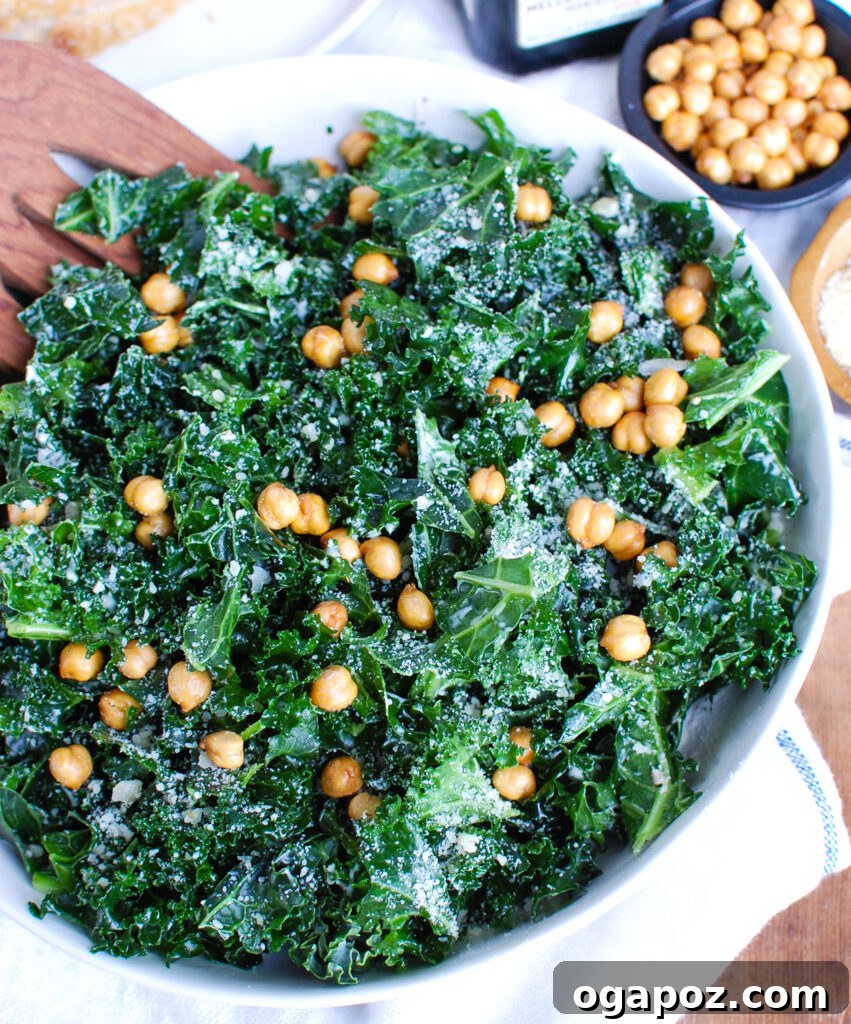 Elevated Kale Caesar 4 Close-up of Kale Caesar Salad with crispy chickpeas and vibrant dressing.