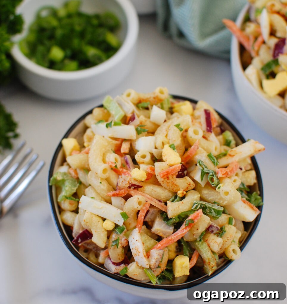 Creamy Macaroni Egg Salad 3 Close-up of Macaroni Egg Salad in a small white bowl