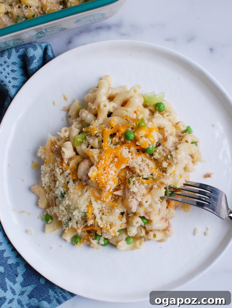 Quick and Creamy Tuna Noodle Bake 6 Easy Tuna Noodle Casserole with fork