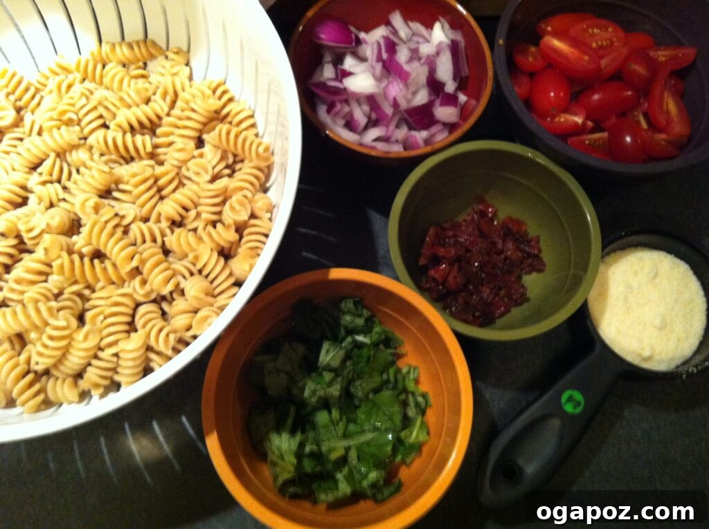 Pasta Salad Ingredients Ingredients laid out for Bistro Chicken Pasta Salad preparation