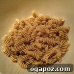 Cooking Pasta Step-by-step image of pasta cooking