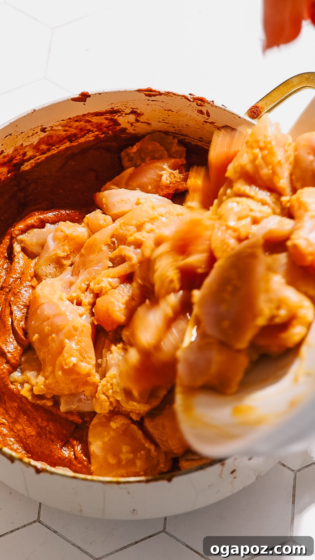Perfect Butter Chicken From Your Kitchen Outshining Restaurants 8 Adding the marinated chicken pieces to the creamy butter chicken sauce.