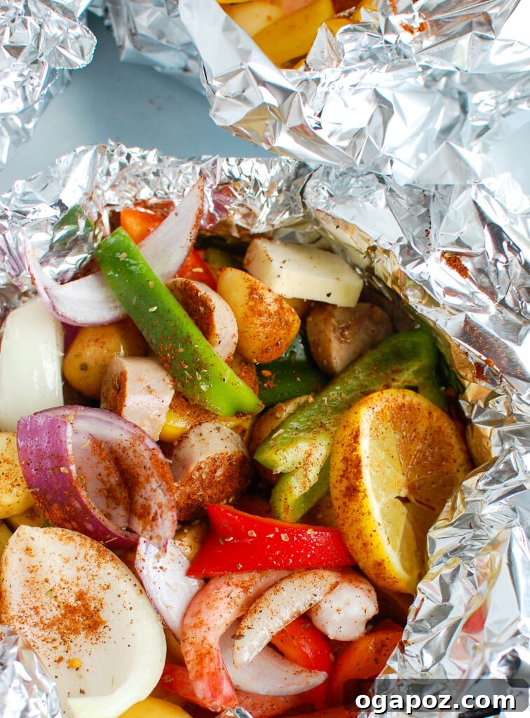 Effortless Sausage and Shrimp Foil Meals 2 Sausage and Shrimp Foil Packets in the packet, ready to be cooked or served.