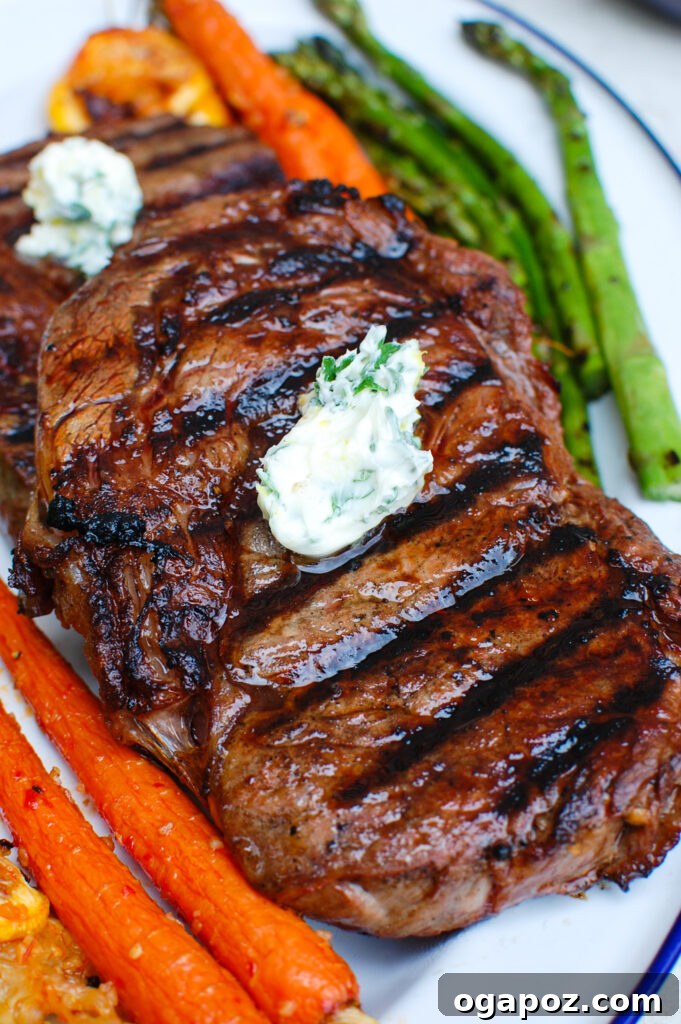 Grilled Ribeye with Lemon Garlic Butter 2 Lemon Garlic Butter Grilled Ribeye on a plate, ready to be served