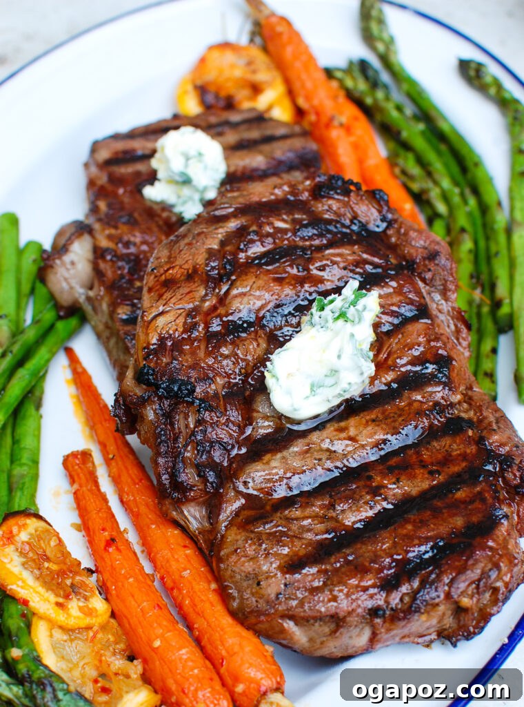 Grilled Ribeye with Lemon Garlic Butter 5 Lemon Garlic Butter Grilled Ribeye steak topped with a pat of butter