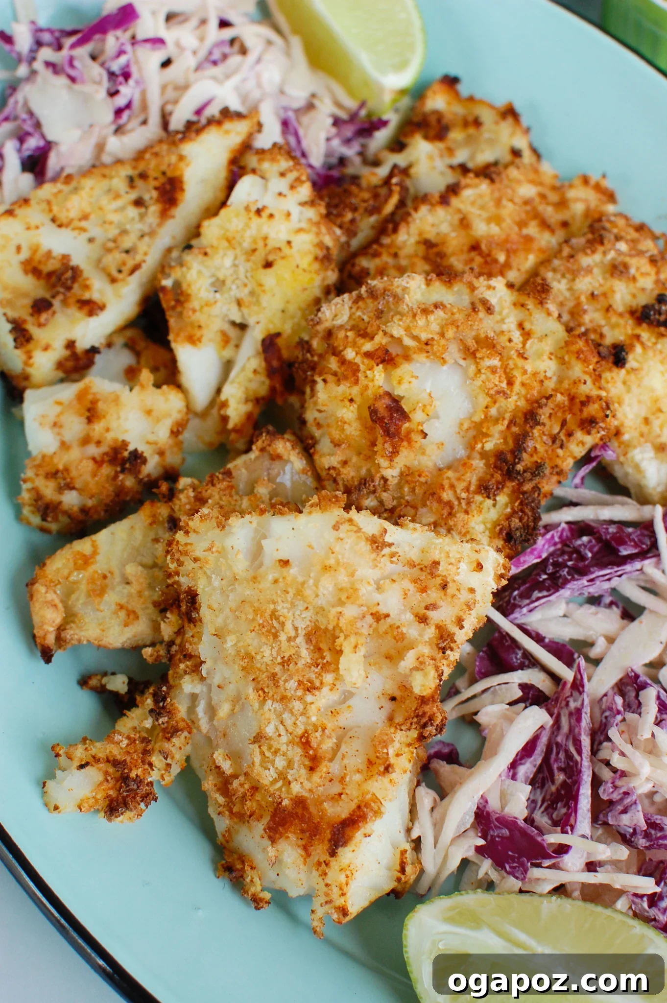 Effortless Cod Fish Tacos 3 Crispy Air Fryer Cod fillets on a blue plate