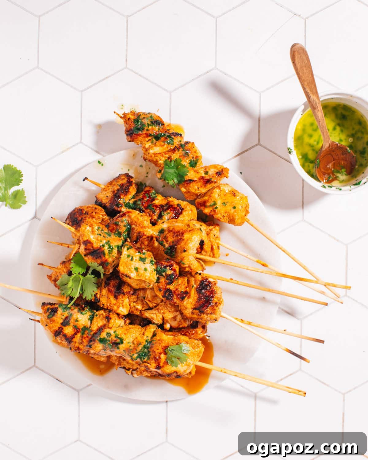 Ultimate Chicken Tikka: Grill, Oven, & Air Fryer 6 Juicy Chicken Tikka served on a plate with garnishes, ready to eat.