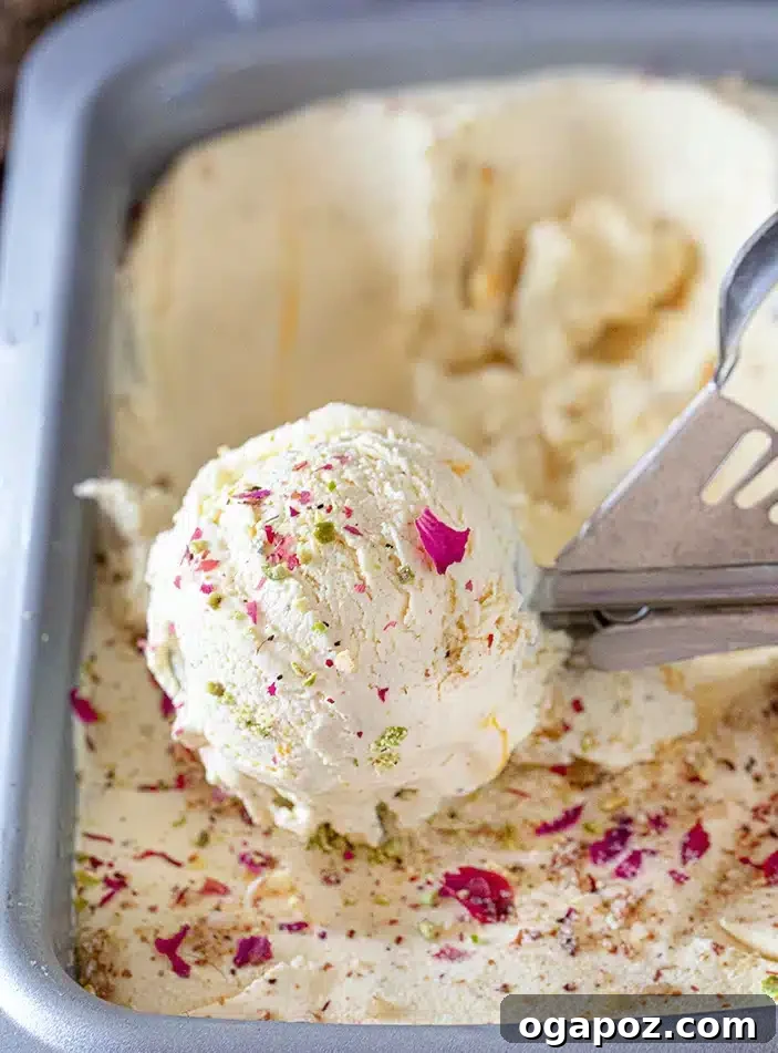 Easy Indian Desserts That Wow 19 Vibrant Thandai Gulkand Ice Cream, a unique scoop combining sweet rose petal jam and crunchy thandai spices, perfect for Holi celebrations.