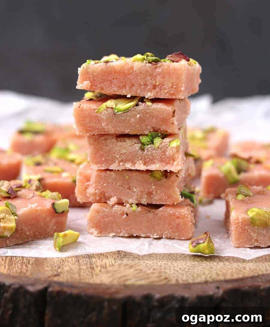 Easy Indian Desserts That Wow 27 Squishy and fragrant Indian Fudge, specifically Rose Barfi, often garnished with pistachios for an elegant presentation and complementary flavor.