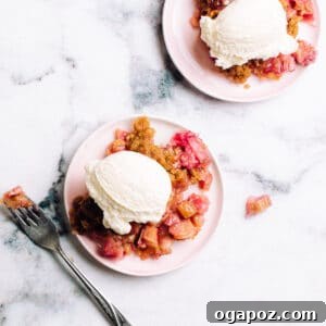 Our Go-To Easy Rhubarb Recipes 28 Delicious Rhubarb Crisp served with ice cream, a highlight of easy rhubarb desserts.