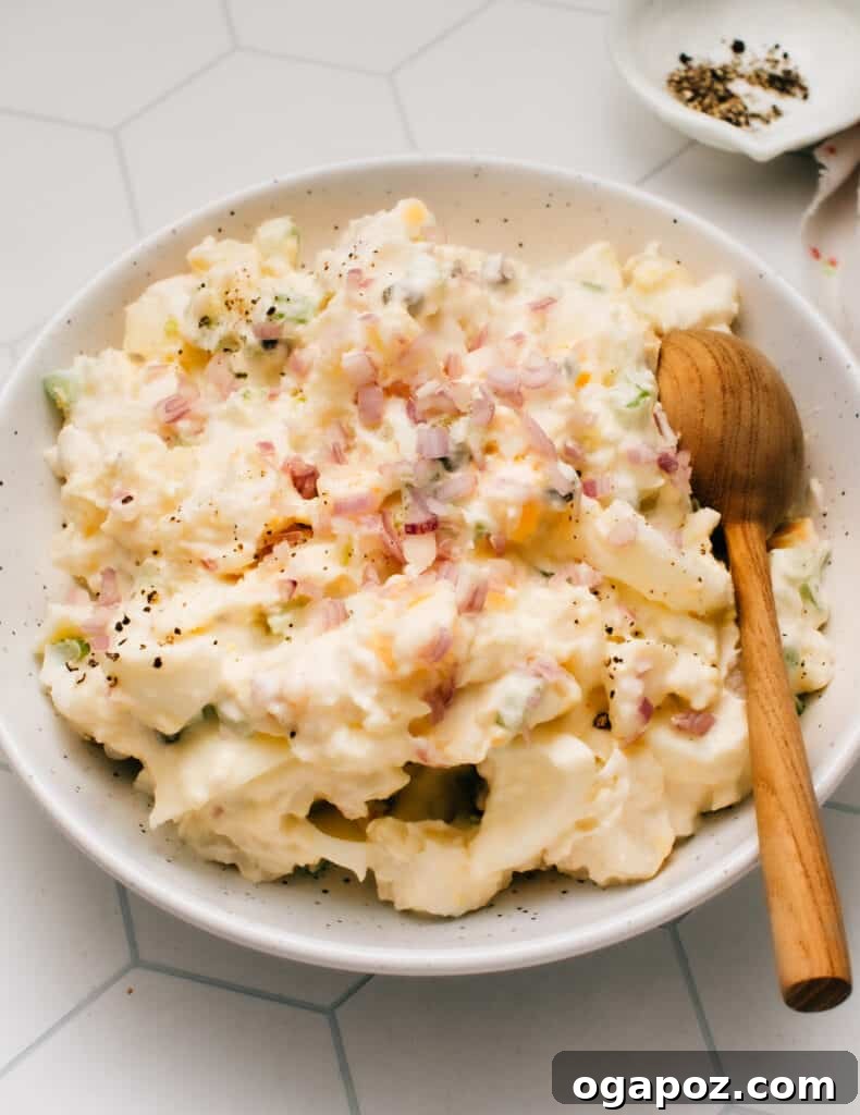 35+ Irresistible Side Dishes for Salmon 14 Classic Homemade Potato Salad with egg, featuring a tangy, lemony, creamy mayonnaise-based dressing lightened with Greek yogurt.
