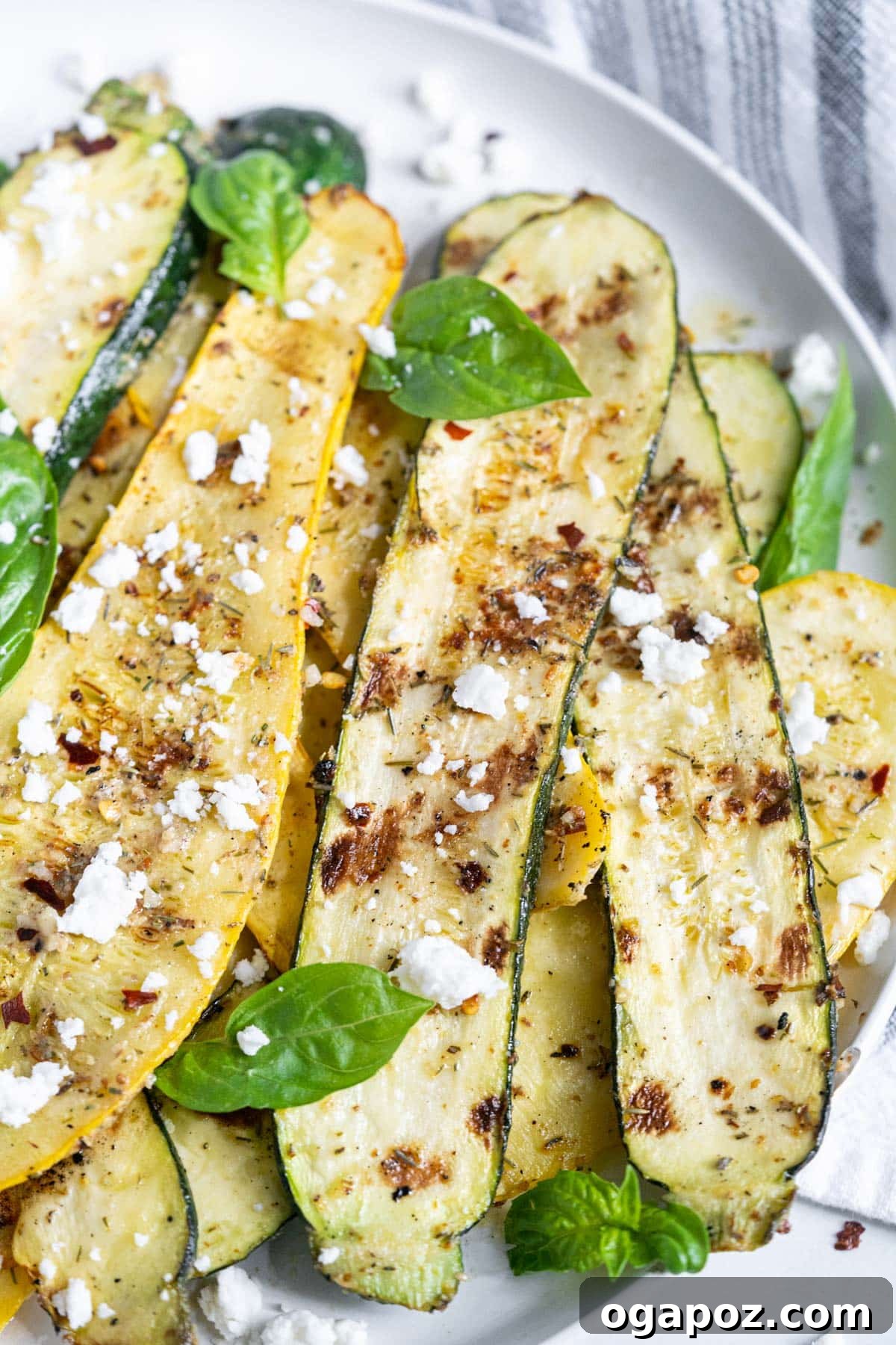 35+ Irresistible Side Dishes for Salmon 9 Grilled Zucchini and Squash, beautifully charred with elegant grill marks.