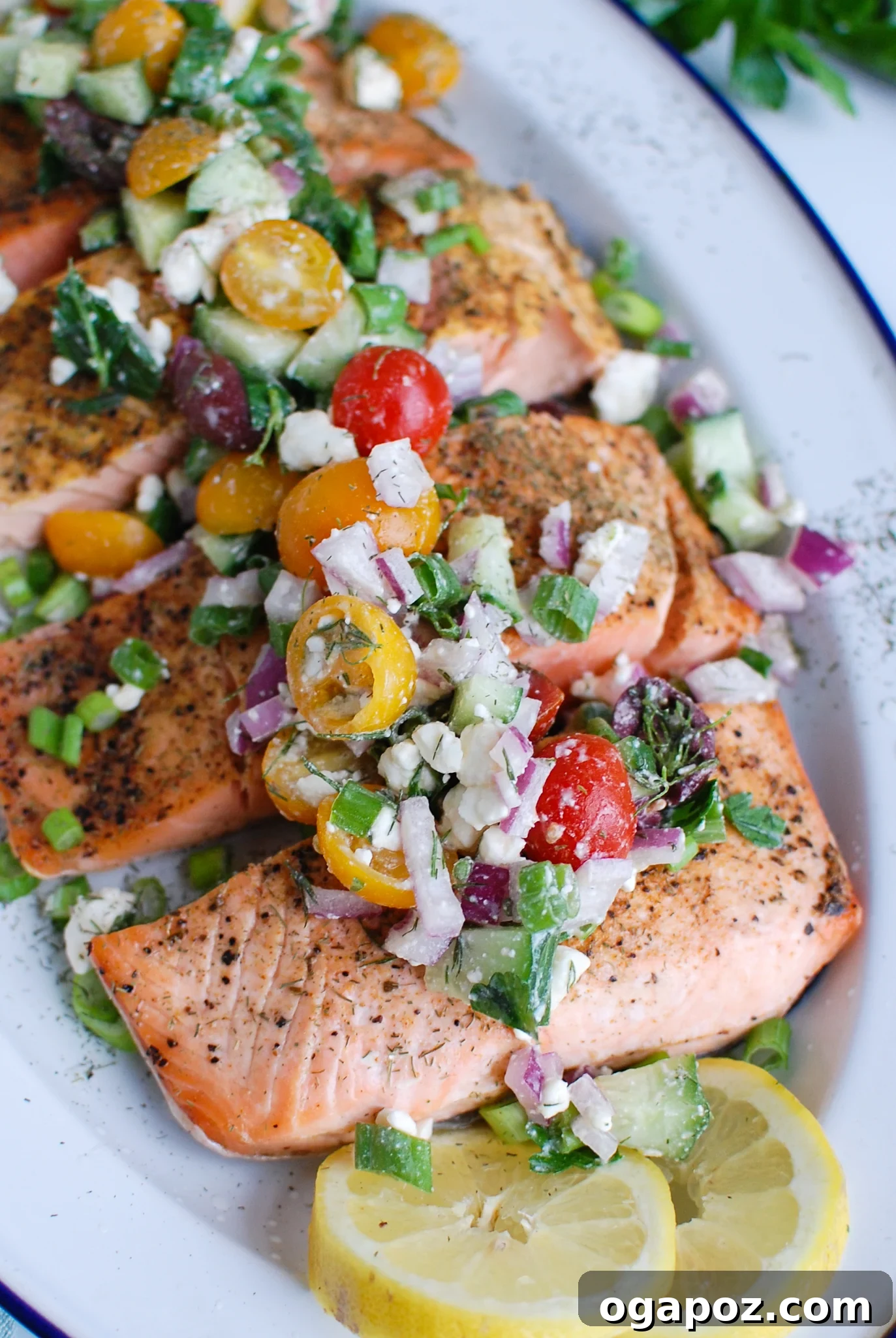 Sun-Kissed Mediterranean Baked Salmon 2 Salmon fillets topped with Greek topping
