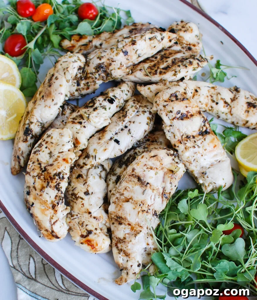 Zesty Lemon Chicken Marinade 4 Lemon Marinade for Chicken served with fresh greens and lemon slices