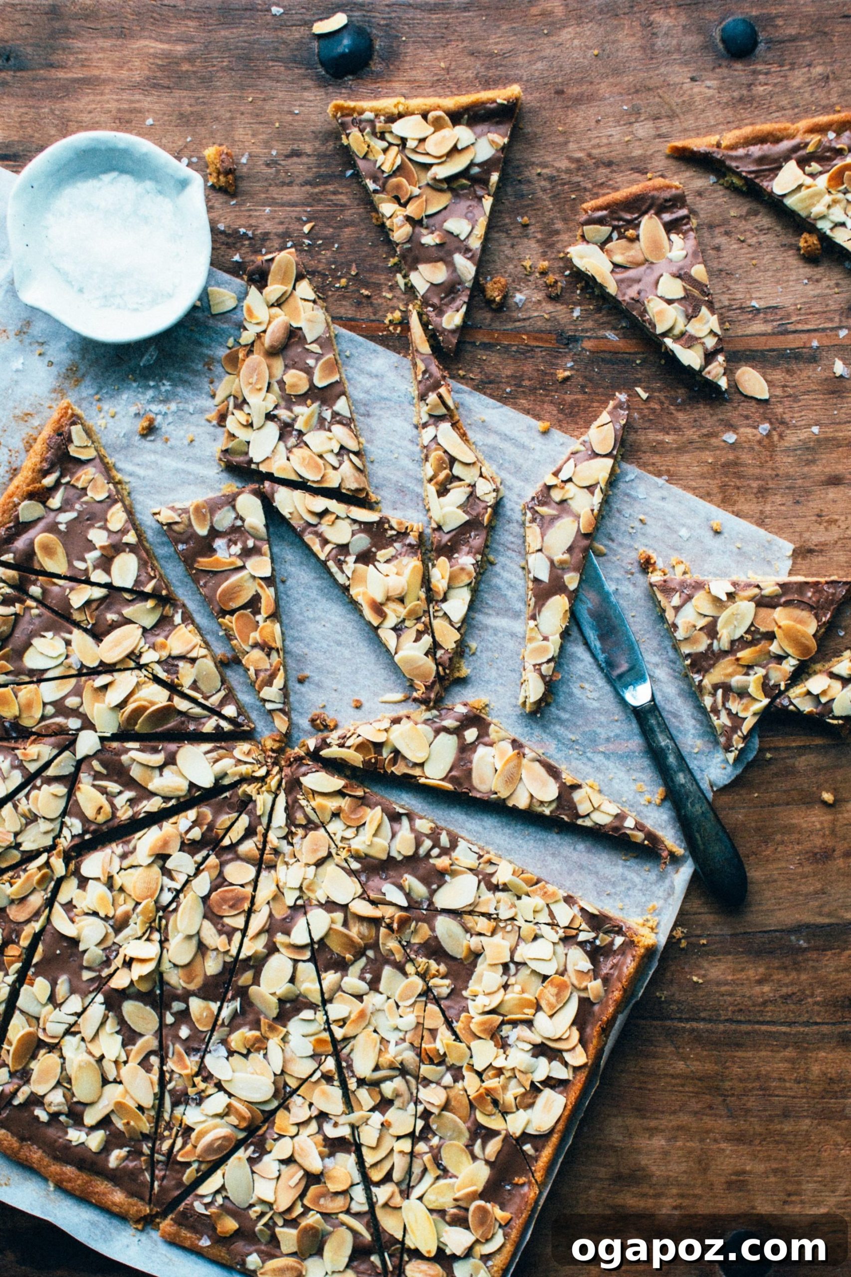 Sweet & Salty Toffee Cookie Crunch 2 Cozy scene with Christmas lights and a tray of homemade Salted Toffee Cookie Bark
