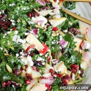 Crisp Autumn Harvest Salad 7 Easy Fall Salad on a white platter with gold spoon